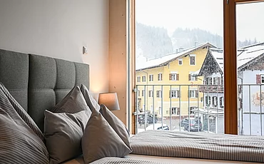 Aussicht aus einen Apartment auf Lofer mit Schneefall