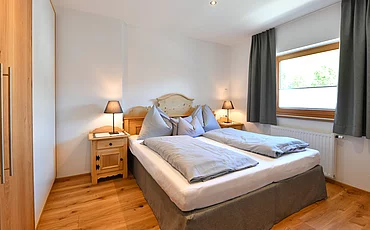 Gemütliches Boxspringbett im Family Haupthaus im Pechtlgut in Lofer