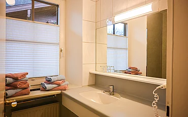 Das Badezimmer im Landhaus Family des Pechtlguts in Lofer