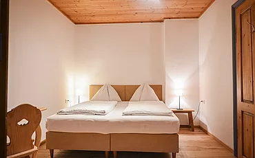 Das Schlafzimmer des Landhaus Family des Pechtlguts in Lofer