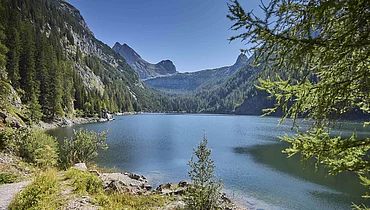 The Diesbach Reservoir, surrounded by mountains in summer